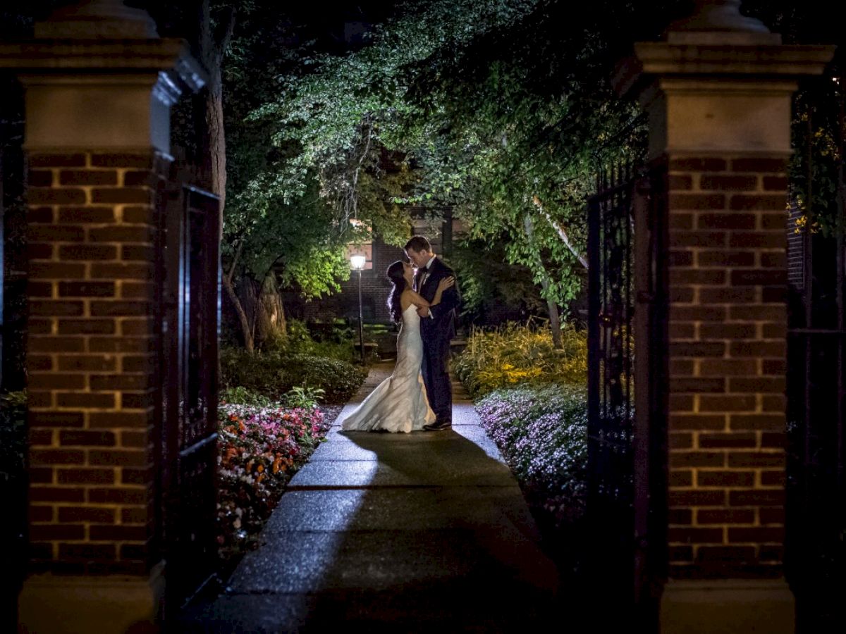 bride and groom in gate way